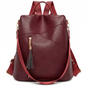 Mochila convertible de eco-cuero Venezia en color rojo borgoña con borla decorativa, vista frontal - Porte Italia.